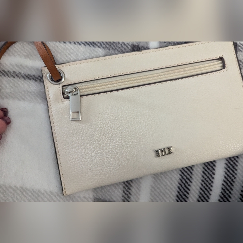 Collection XIIX mini beige wristlet